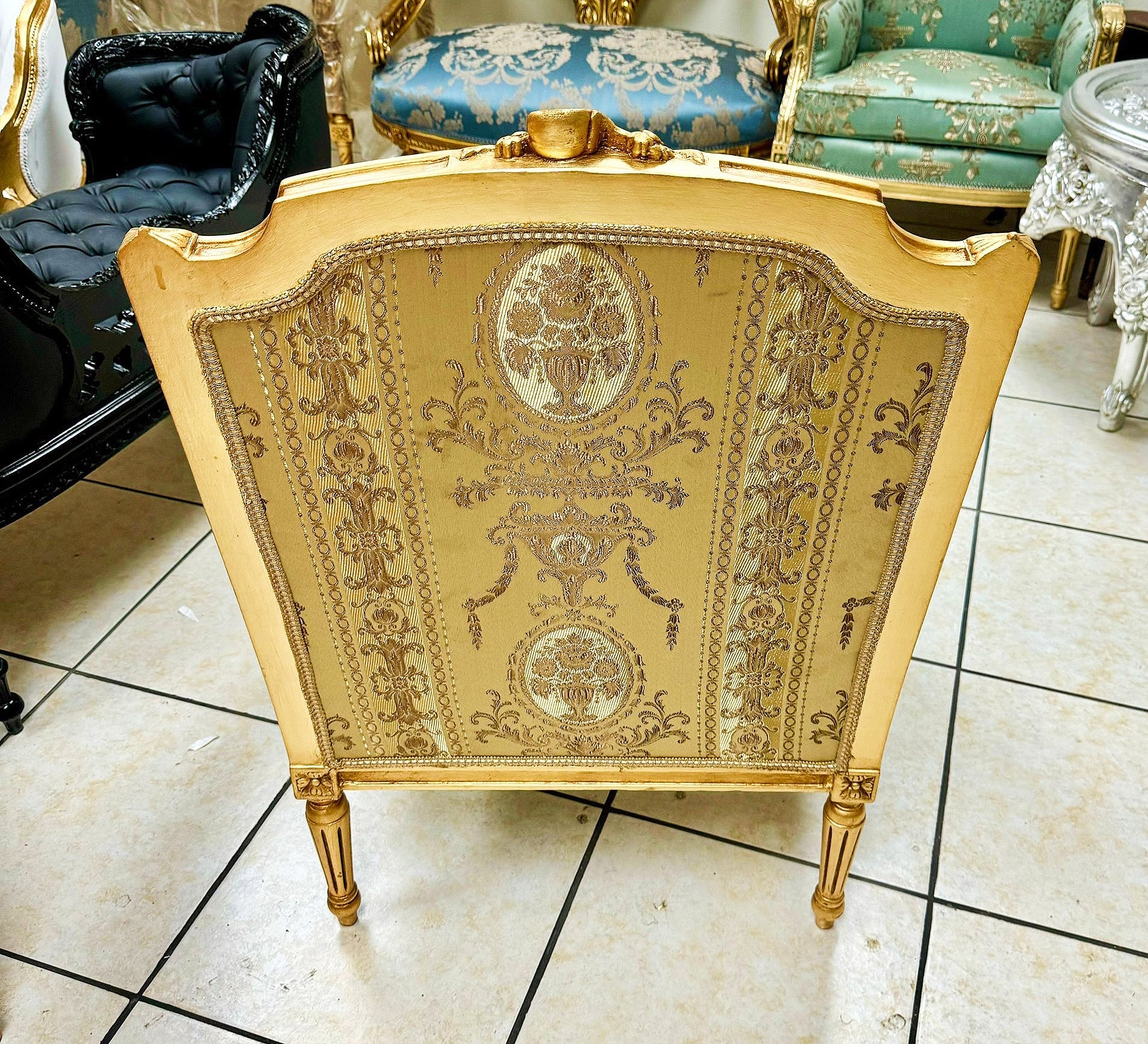 French Louis XV Style Gold Bergere Wing Chair with Gold Leaf Details