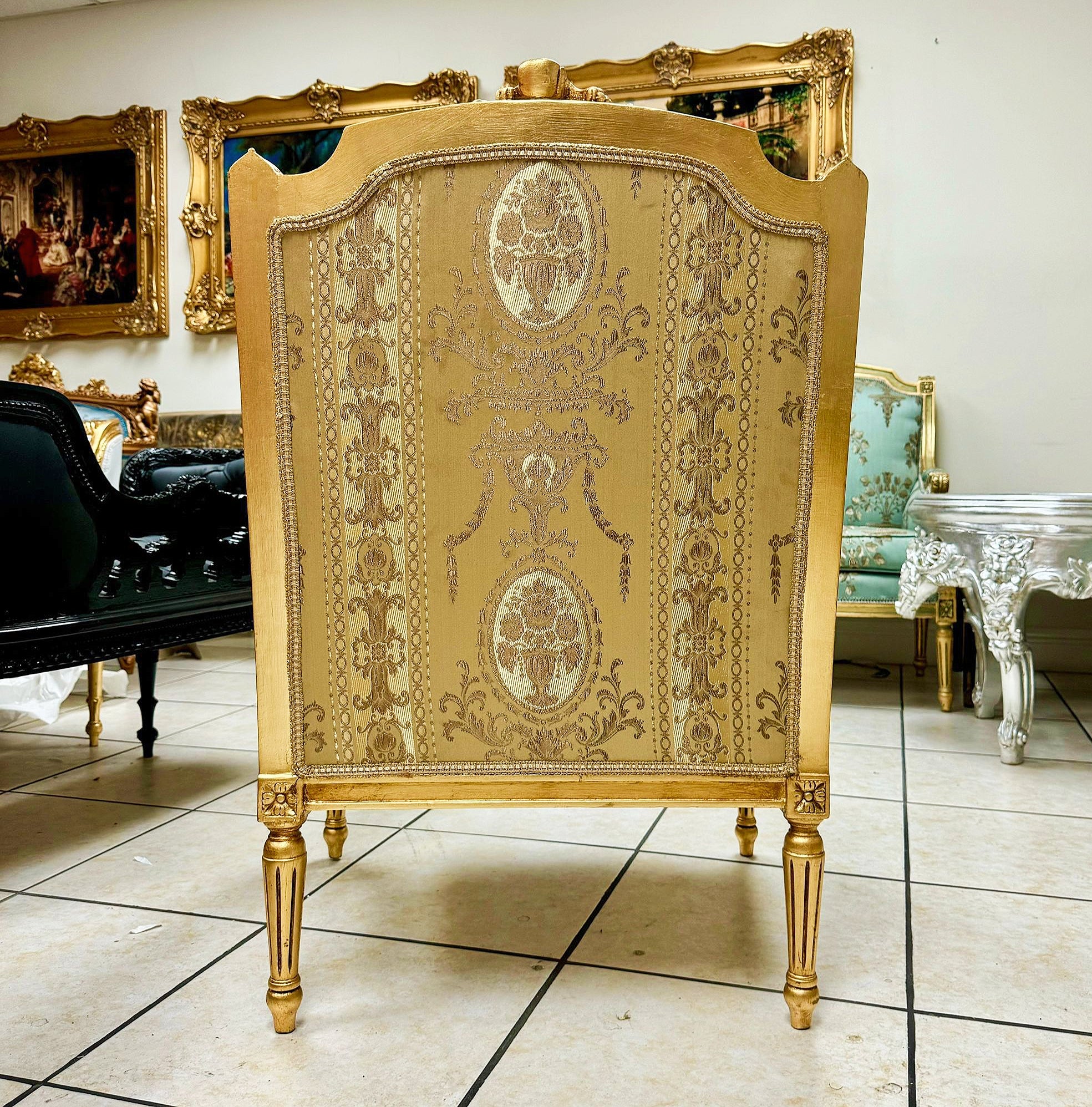 French Louis XV Style Gold Bergere Wing Chair with Gold Leaf Details