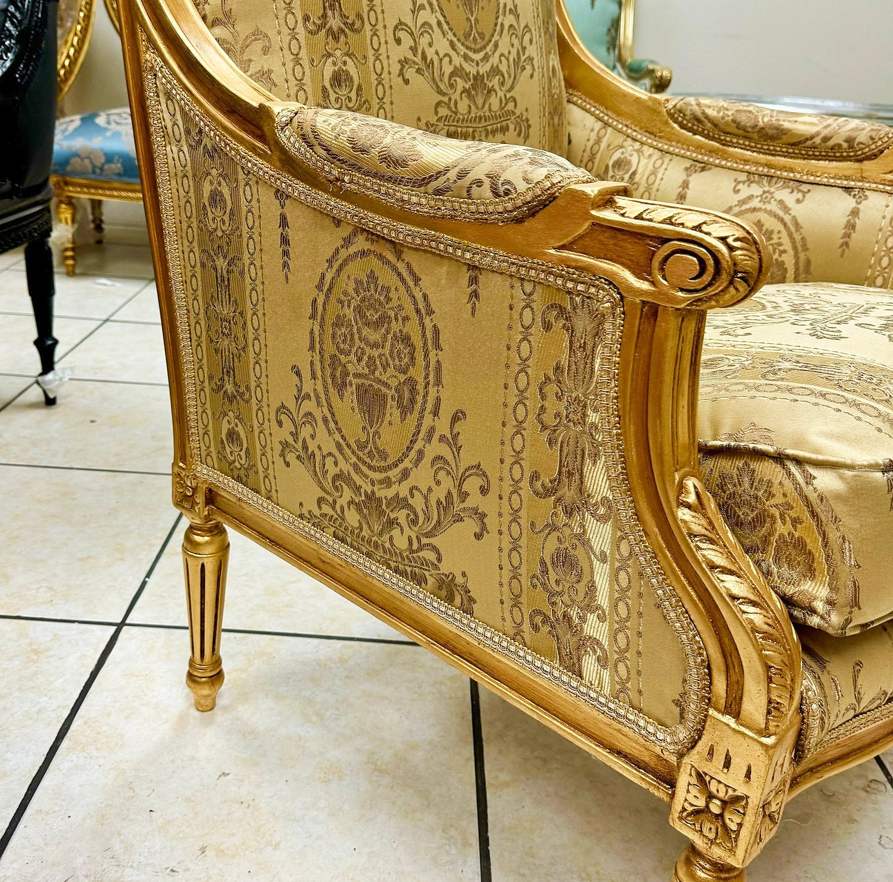 French Louis XV Style Gold Bergere Wing Chair with Gold Leaf Details