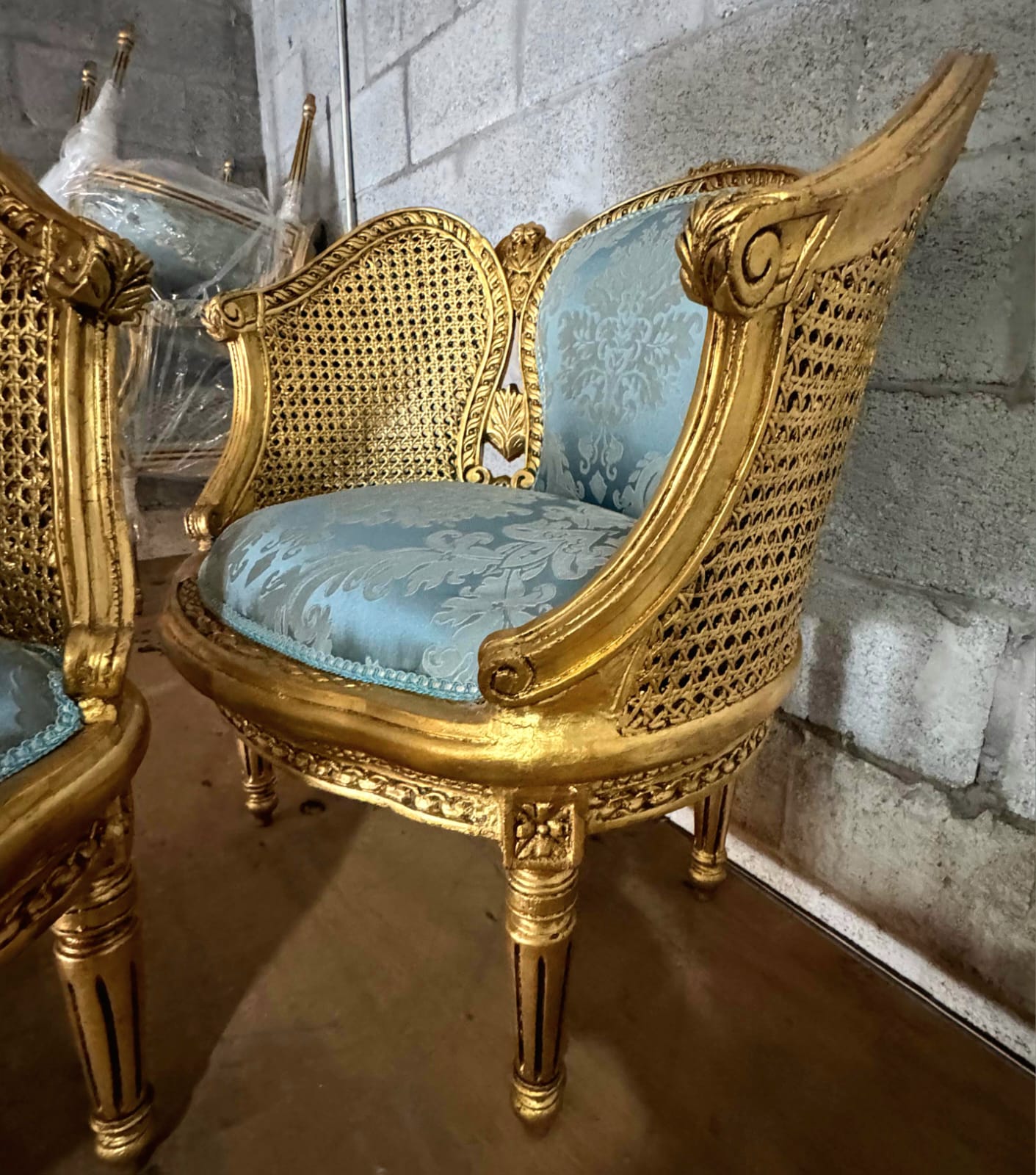 French Louis XV Style Bergere Wing Chair with Gold Leaf Details