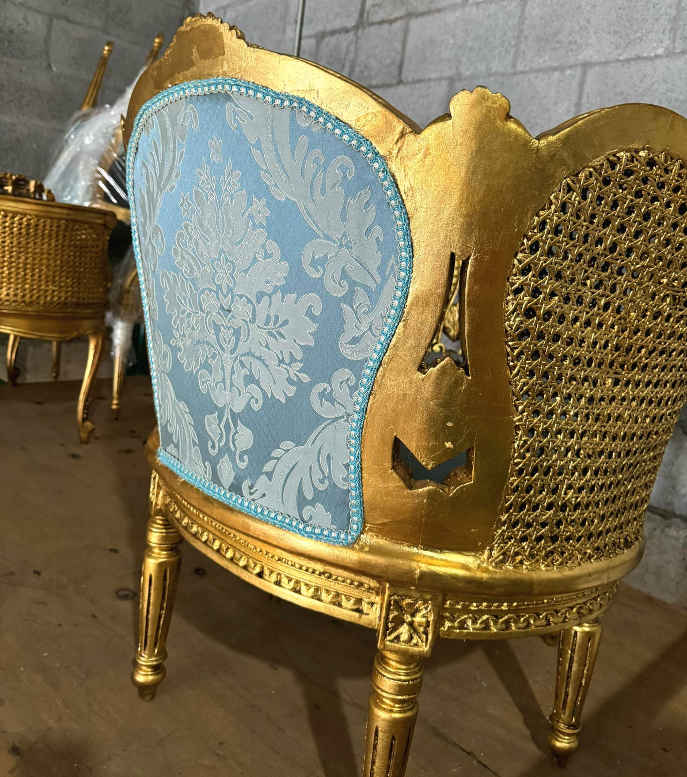 French Louis XV Style Bergere Wing Chair with Gold Leaf Details