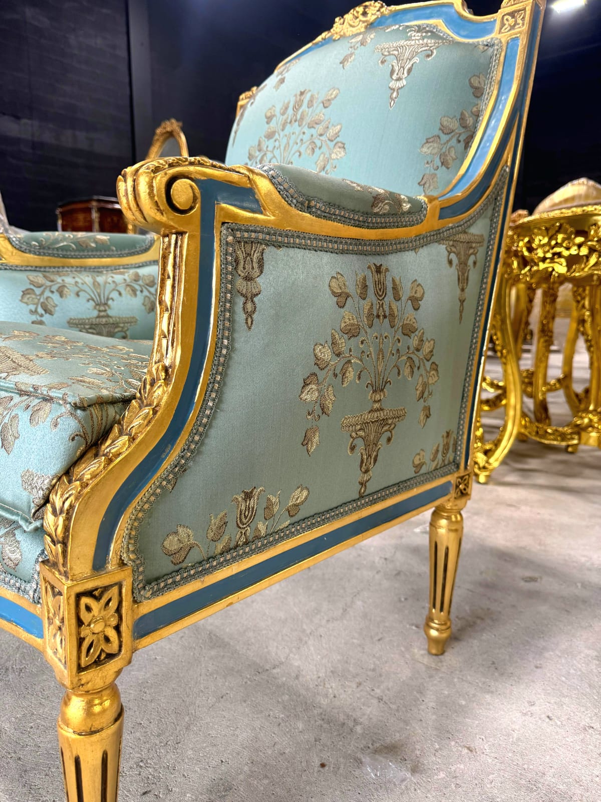 French Louis XV Style Blue-Green Bergere Wing Chair with Blue Trim and Gold Leaf Details