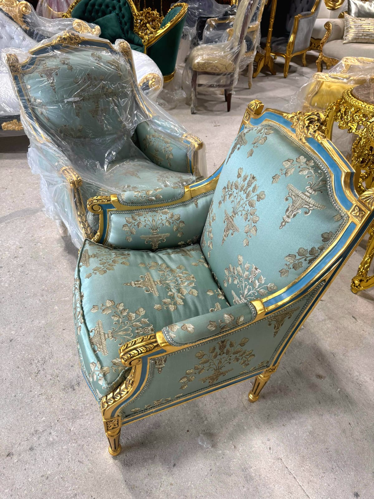 French Louis XV Style Blue-Green Bergere Wing Chair with Blue Trim and Gold Leaf Details