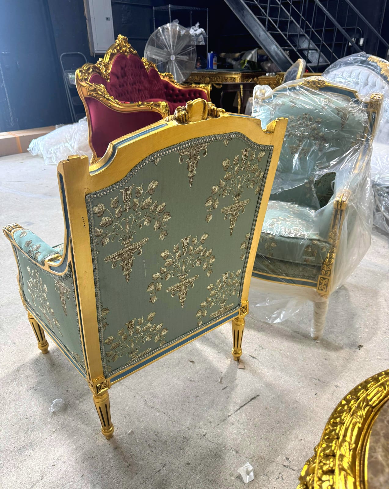 French Louis XV Style Blue-Green Bergere Wing Chair with Blue Trim and Gold Leaf Details