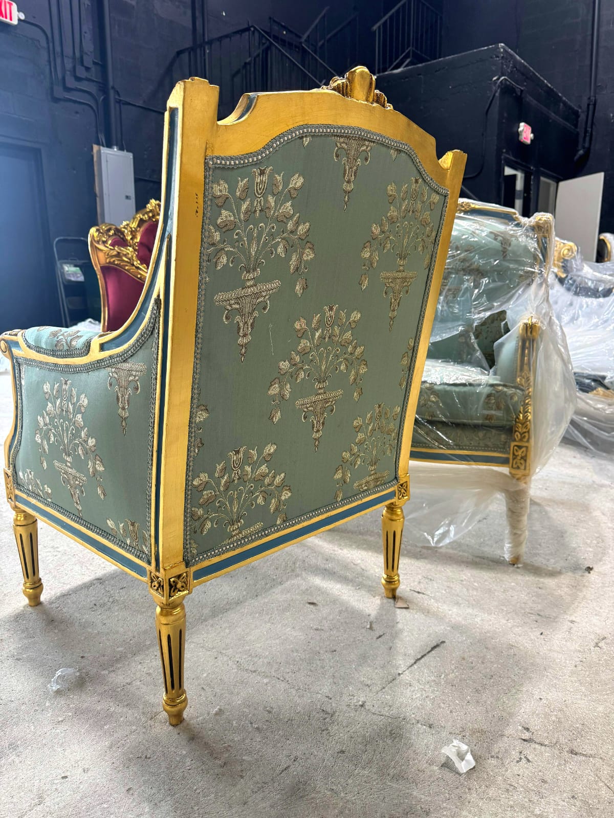 French Louis XV Style Blue-Green Bergere Wing Chair with Blue Trim and Gold Leaf Details
