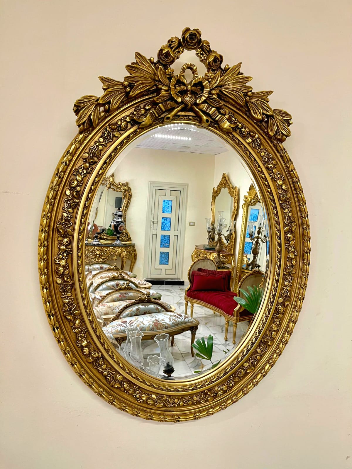 Grand Italian Rococo Oval Wall Mirror with Floral Gold Leaf Frame