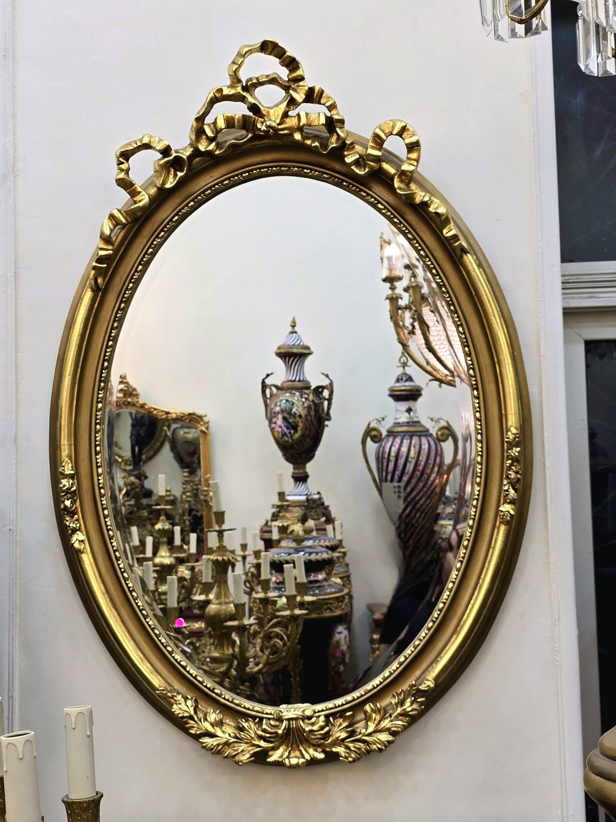Oval Wall Mirror – Hand Carved Gold Leaf Frame with Ribbon Crest Detail