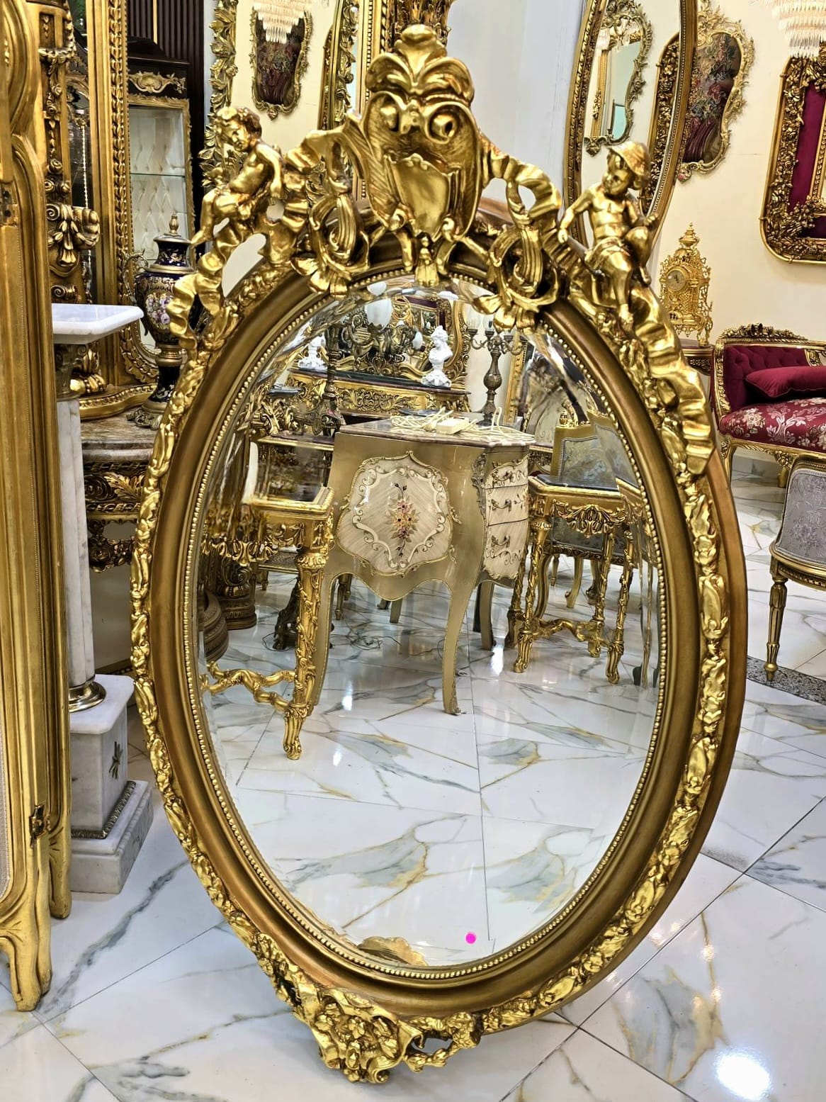 French Cherub Wall Mirror – Hand Carved Gold Leaf Frame with Ornate Floral Details