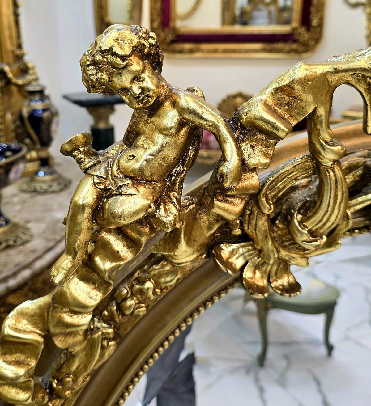 French Cherub Wall Mirror – Hand Carved Gold Leaf Frame with Ornate Floral Details