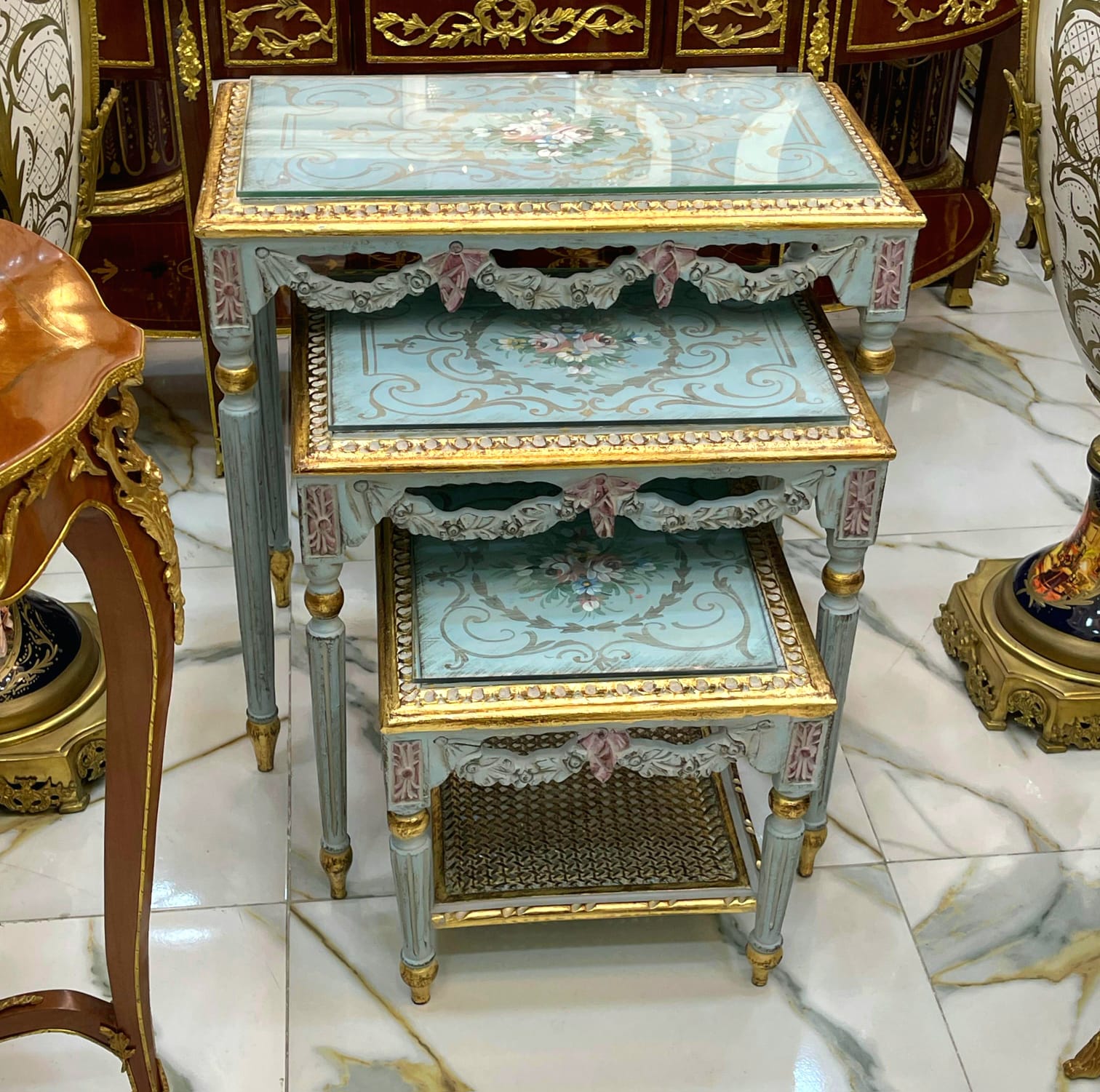 French Style Nesting Tables – Set of 3 with Glass Tops, Soft Blue Finish & Gold Leaf Details
