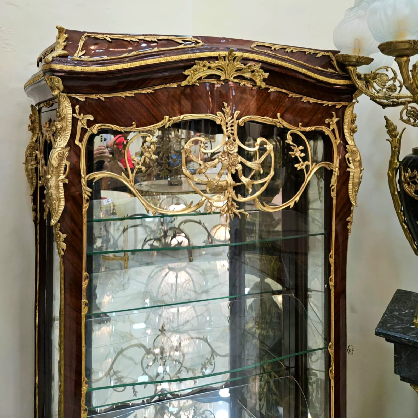 French Louis XV Curio Display Cabinet with Glass Shelves, Gold Leaf Accents & Bombe Silhouette