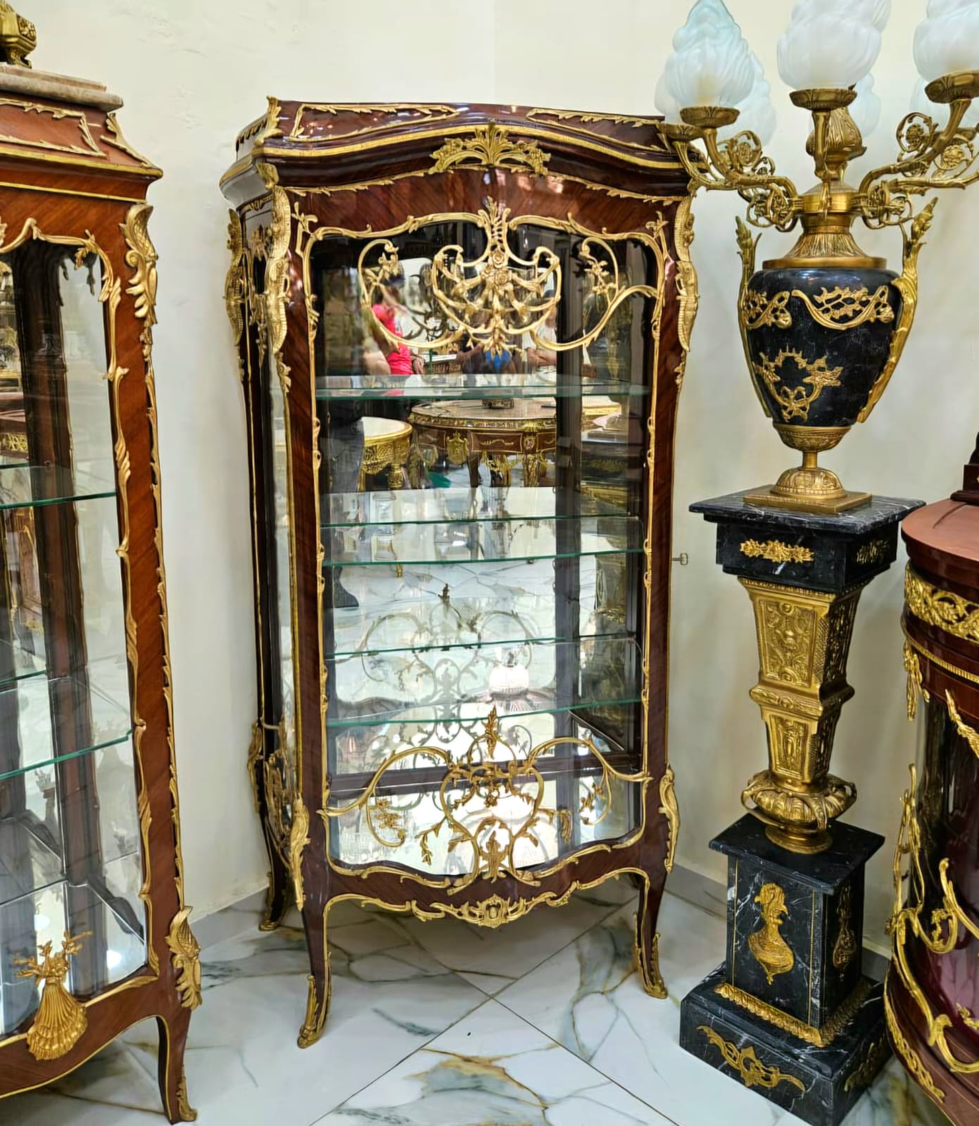 French Louis XV Curio Display Cabinet with Glass Shelves, Gold Leaf Accents & Bombe Silhouette