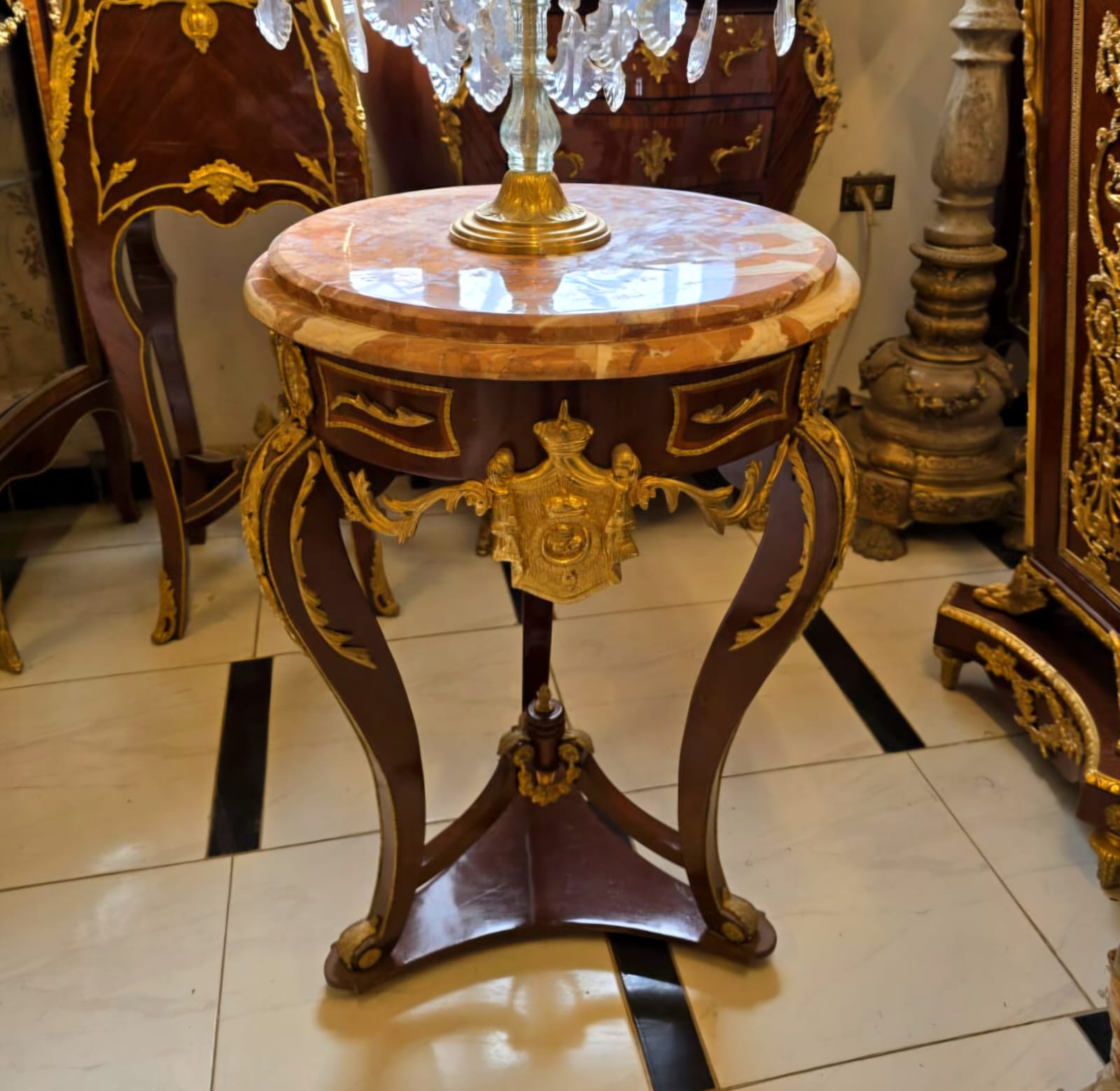 French Empire Marble Top Side Table with Gold Leaf Accents & Bronze Crest Detail