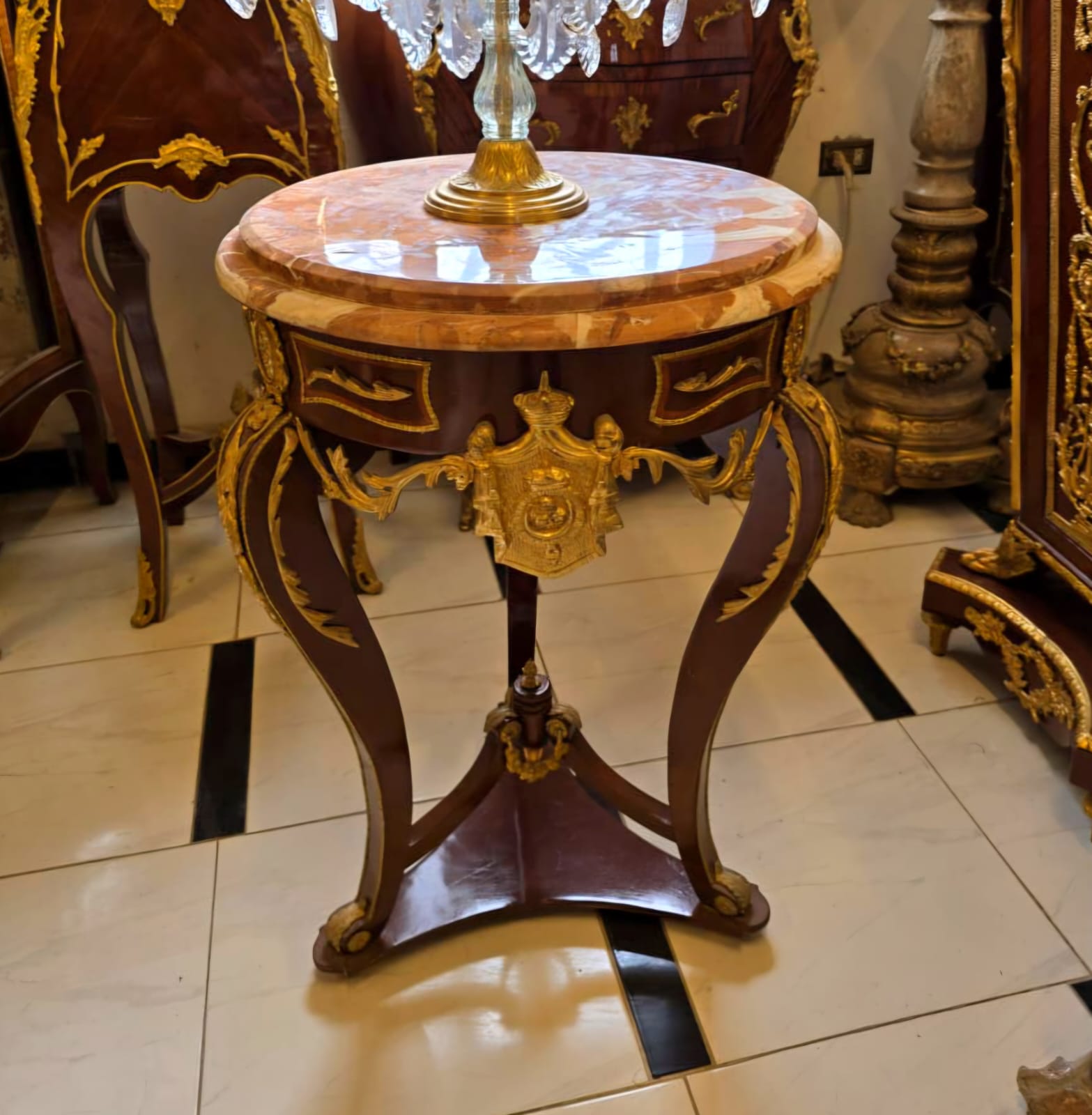 French Empire Marble Top Side Table with Gold Leaf Accents & Bronze Crest Detail
