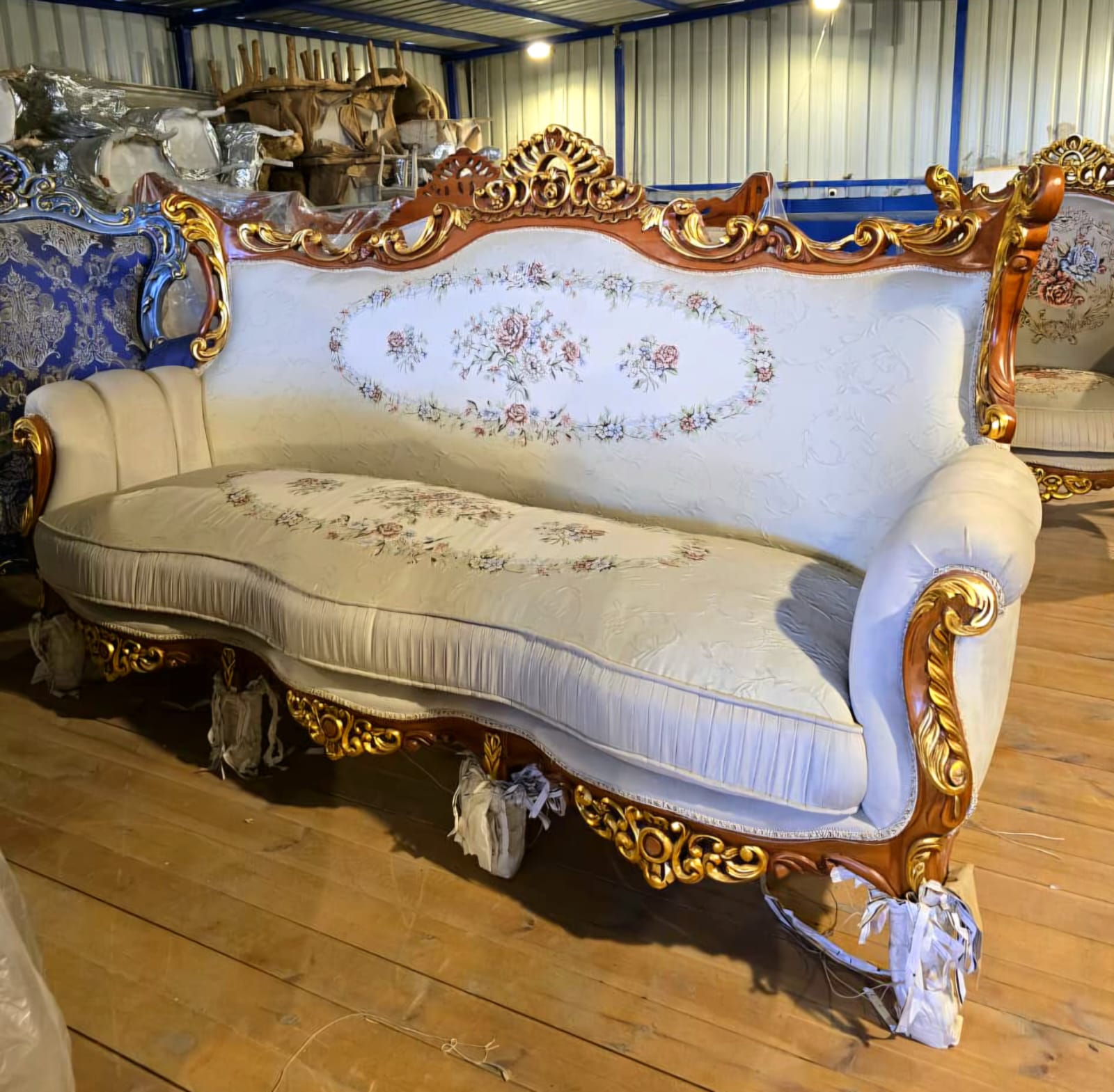 Grand French Louis XV Three-Seat Sofa with Floral Upholstery & Hand-Carved Gold Leaf Frame