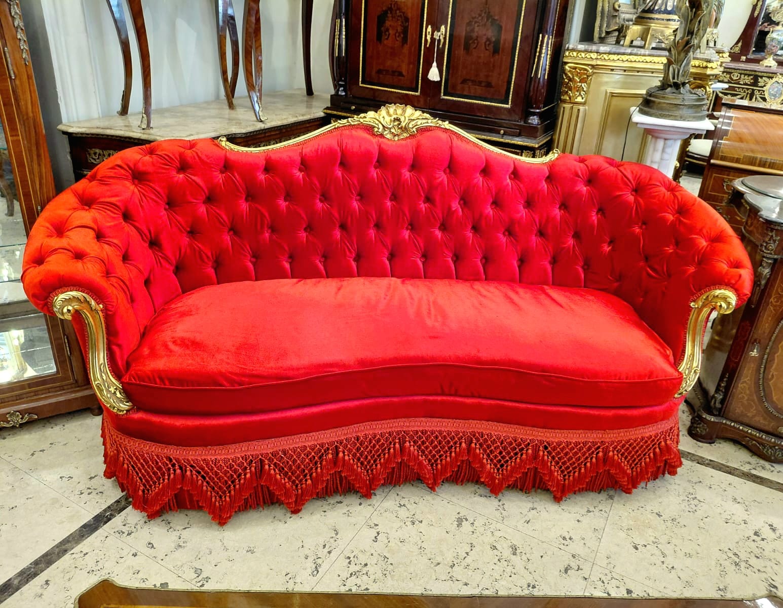 Grand French Victorian Three-Seat Red Velvet Sofa with Hand-Carved Gold Leaf Frame