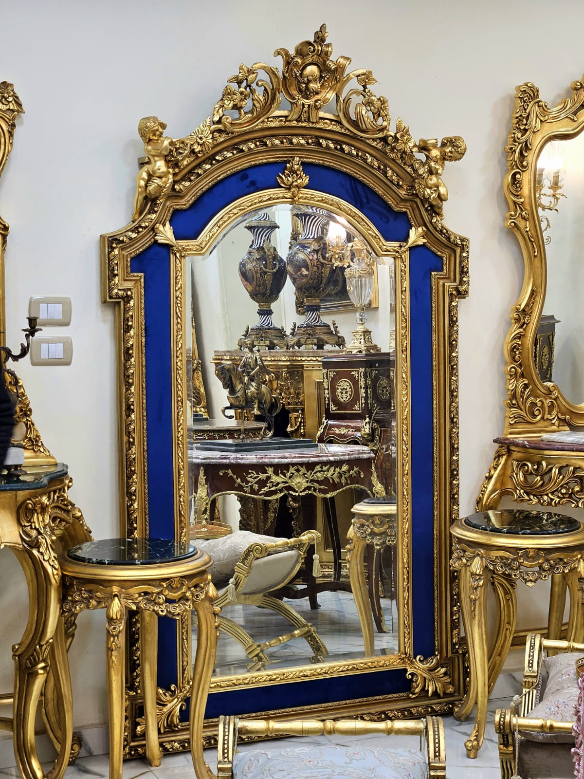Grand French Baroque Wall Mirror with Royal Blue Velvet Panels, Cherub Crest & Gilded Frame