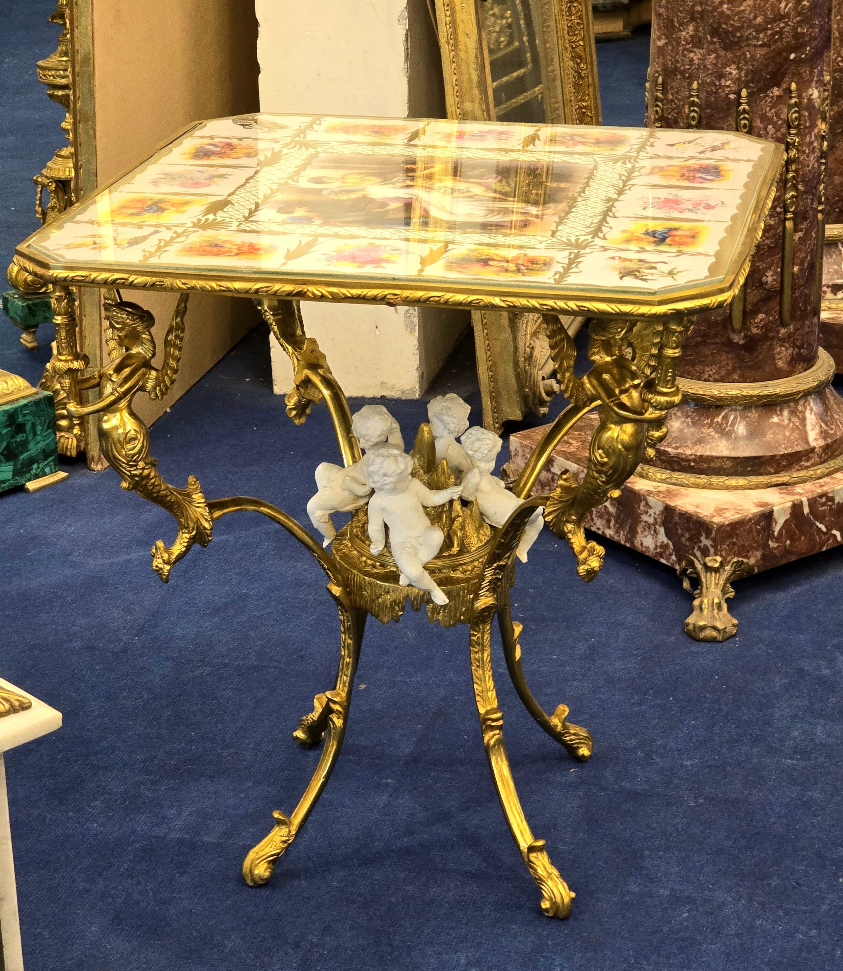 Romantic French Style Coffee Table with Cherub Artwork, Bronze Accents & Gold Leaf Details