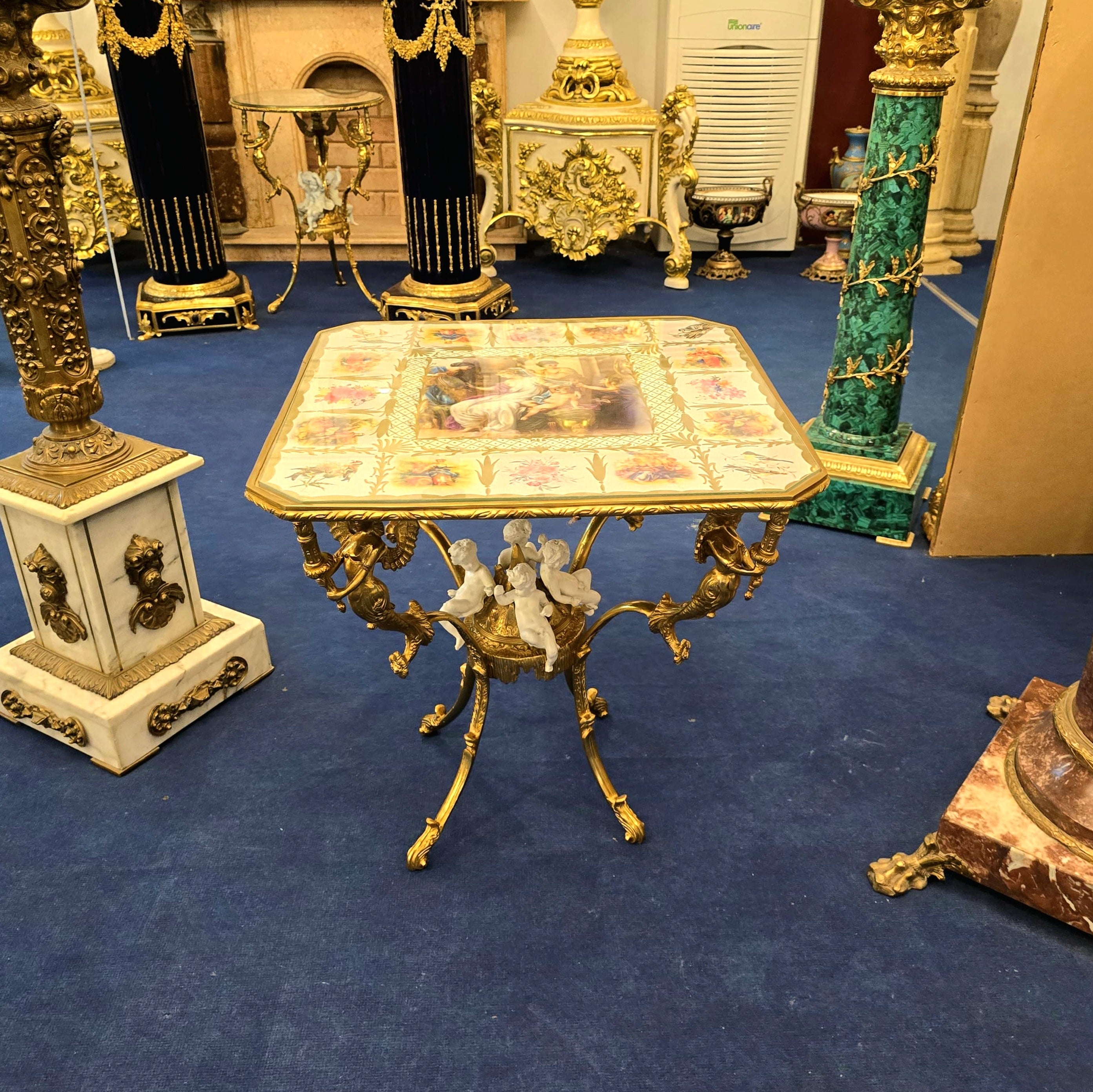Romantic French Style Coffee Table with Cherub Artwork, Bronze Accents & Gold Leaf Details