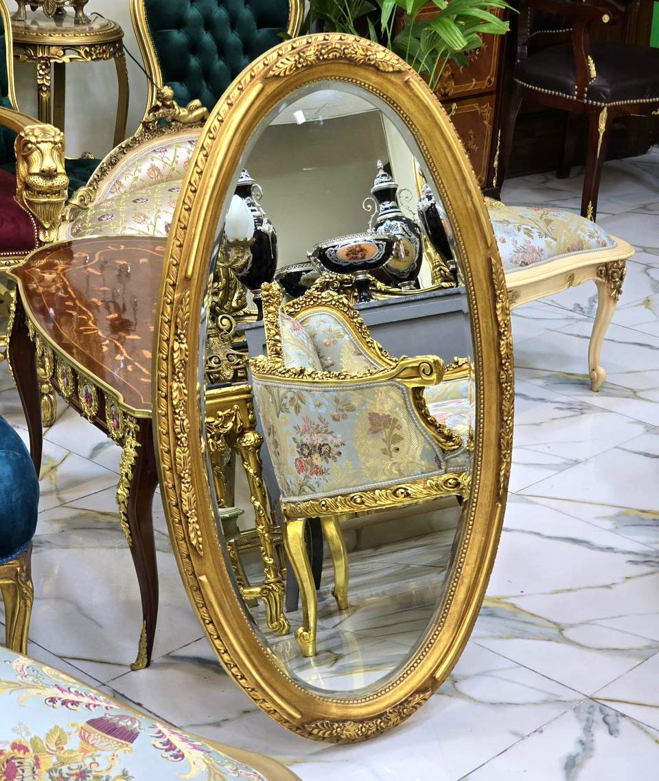 French Oval Wall Mirror with Floral Center Detail & Gold Leaf Frame