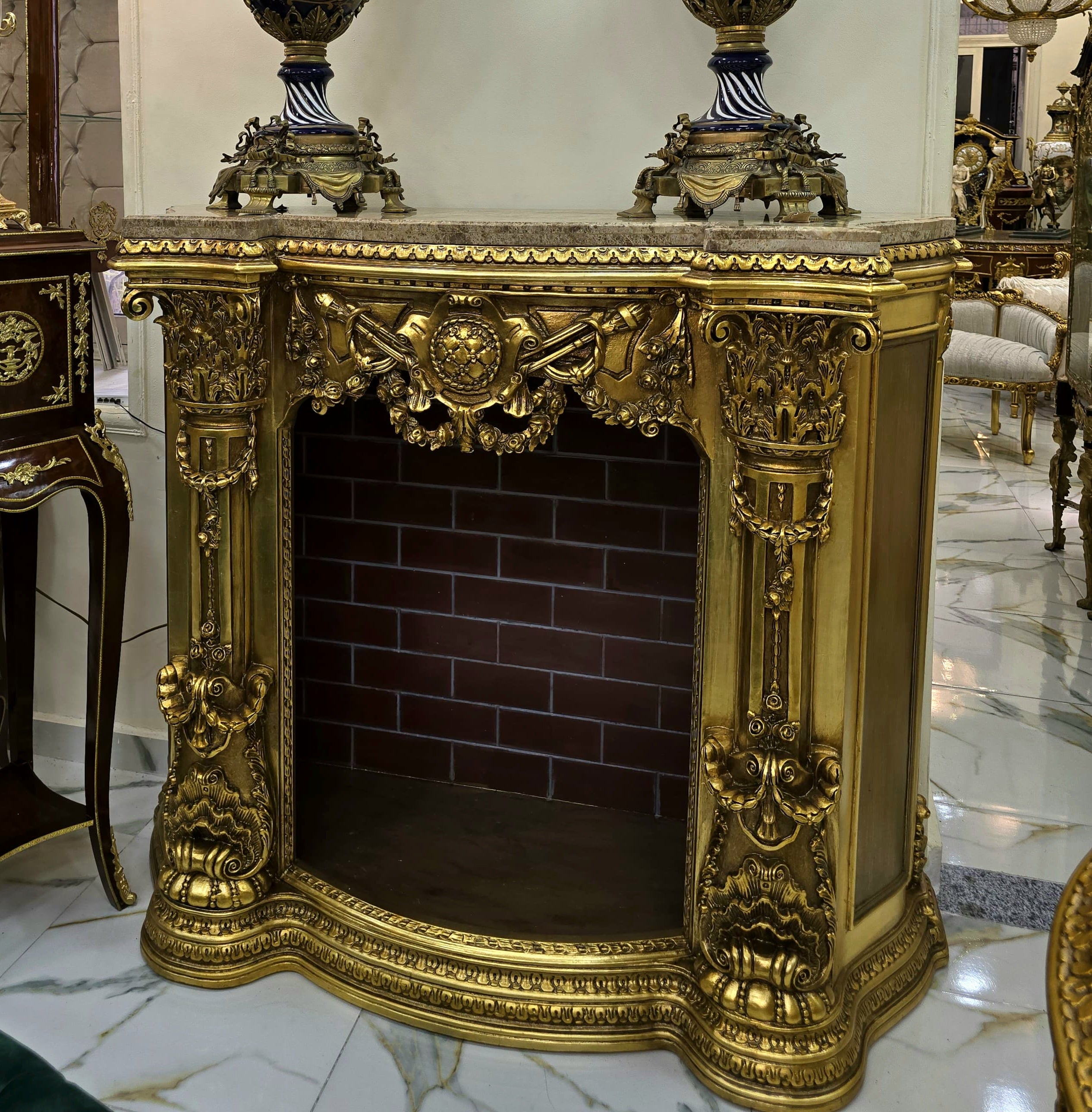Ornate French Style Fireplace Cabinet with Marble Top & Gold Leaf Accents