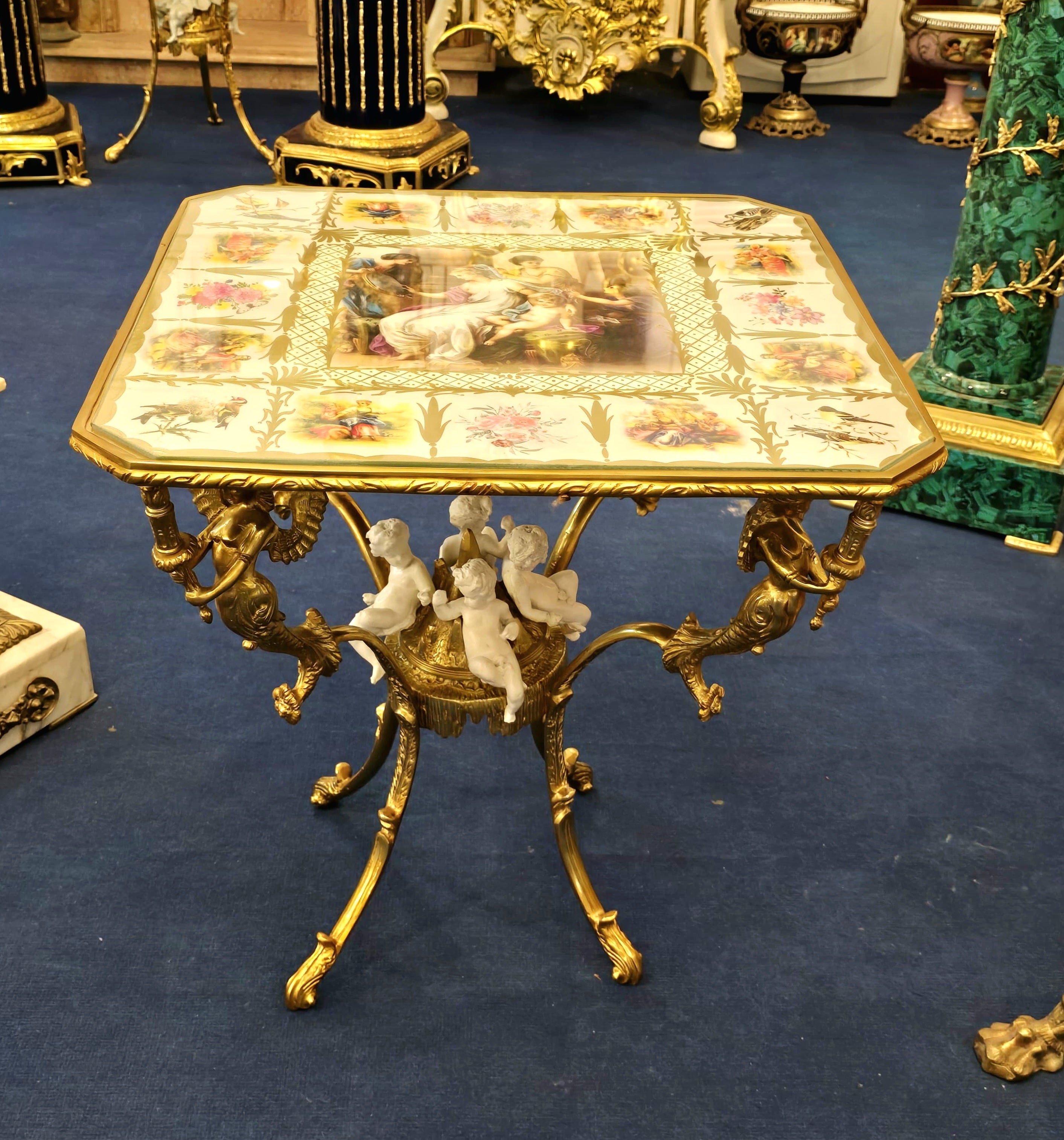 Romantic French Style Coffee Table with Cherub Artwork, Bronze Accents & Gold Leaf Details